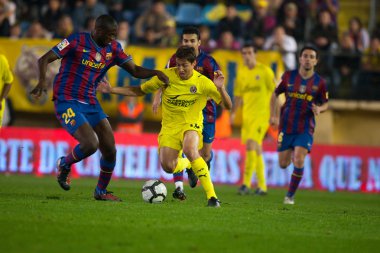 David Fuster (C) ve Yaya Toure (L) eylem