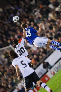 Ricardo Costa (L) ve Klaas-Jan Huntelaar (R) eylem
