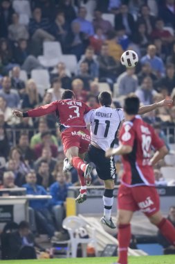 Joao Victor (L) ve eylem: Aritz Aduriz (R)