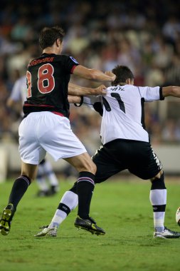 Carlos Gurpegi (L) ve Roberto Soldado (R) oyun sırasında