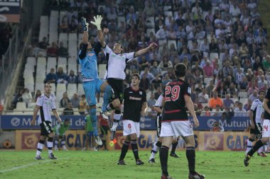 Kaleci Gorka Iraizoz (L) ve eylem: Aritz Aduriz (R)