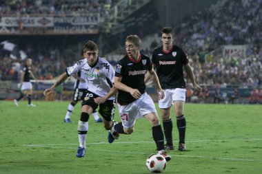Iker Muniain (R) ve Pablo Hernandez (L) eylem