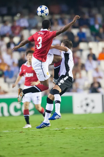 Patrice Evra y Pablo durante el partido —  Fotos de Stock