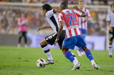 Facundo Alberto Costa (L) ve Luis Perea (R) eylem