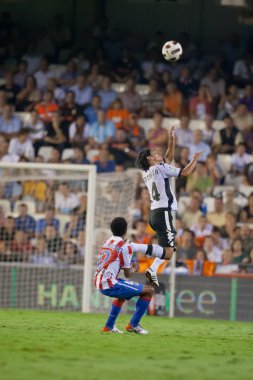 Facundo Alberto Costa (R) ve Paulo Assunçao eylem