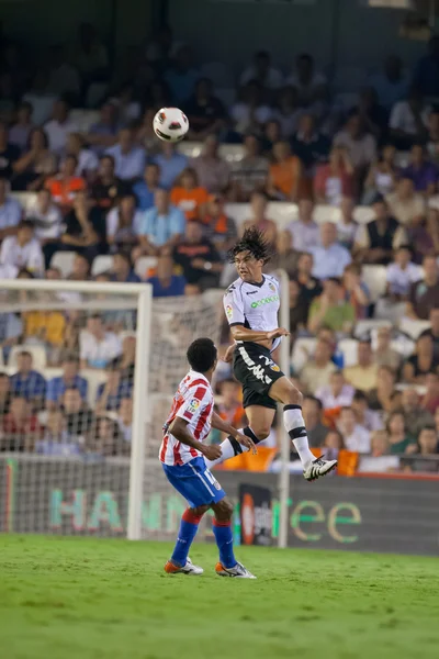 Facundo alberto costa (r) und paulo assuncao in Aktion — Stockfoto