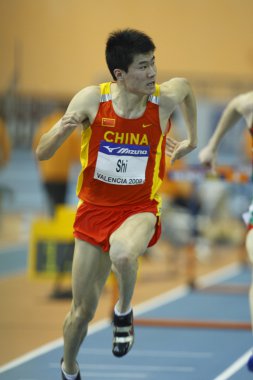 Dongpeng Shi Çin'in rekabet Mens 60 metre engelli ısı