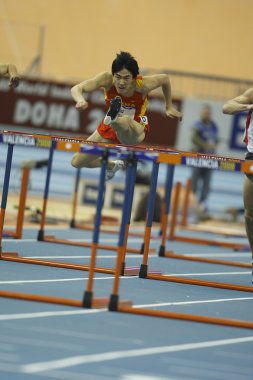 Liu Xiang of China compete in Final of the Mens 60 Metres Hurdles Heat clipart
