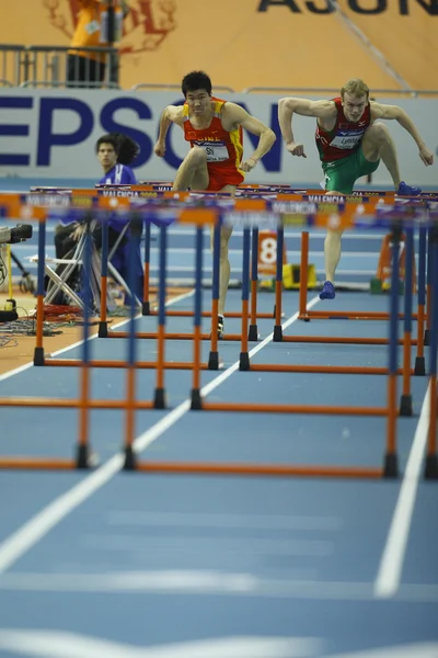 Dongpeng Shi Chin konkurować w męskie 60 metrów przez płotki ciepła — Zdjęcie stockowe