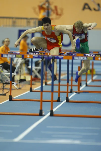 Dongpeng Shi Chin konkurować w męskie 60 metrów przez płotki ciepła — Zdjęcie stockowe
