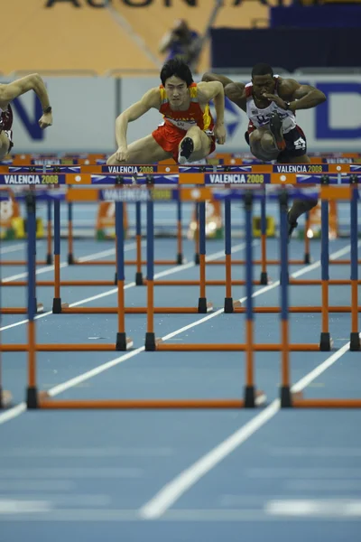 Liu Xiang of China compete in Semifinal of the Mens 60 Metres Hurdles Heat — Stock Photo, Image