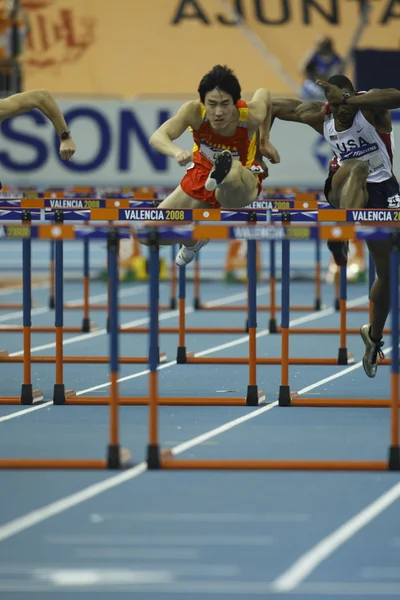 Лю Сян из Китая участвует в полуфинале Mens 60 Metres Hurdles Heat — стоковое фото