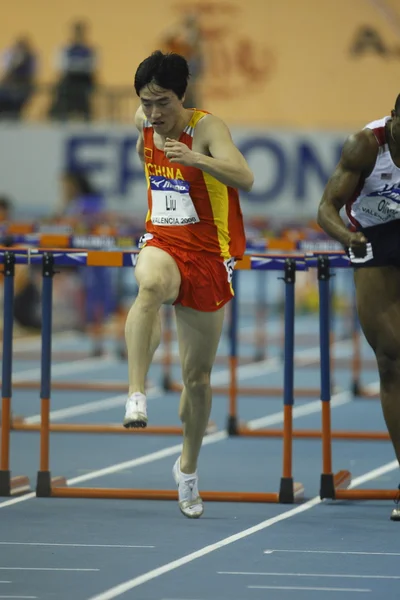 Liu Xiang of China compete in Semifinal of the Mens 60 Metres Hurdles Heat — Stock Photo, Image