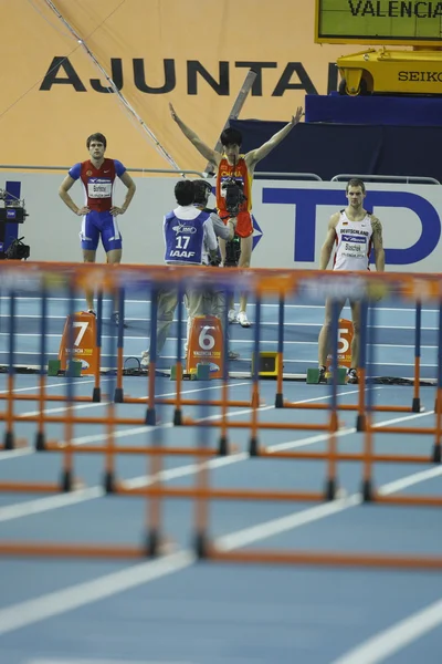 Лю Сян из Китая участвует в финале Mens 60 Metres Hurdles Heat — стоковое фото