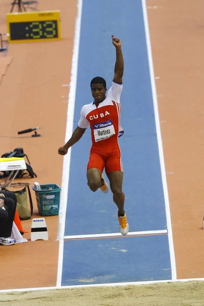Wilfredo Martinez compete na qualificação Mens Long Jump — Fotografia de Stock