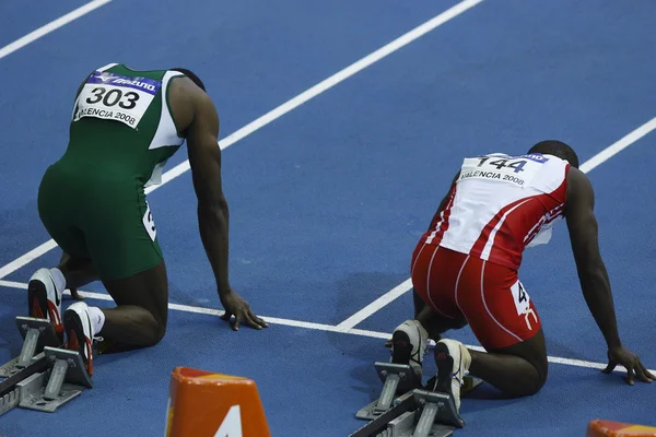 Atletas compete na pista de 60m Men — Fotografia de Stock