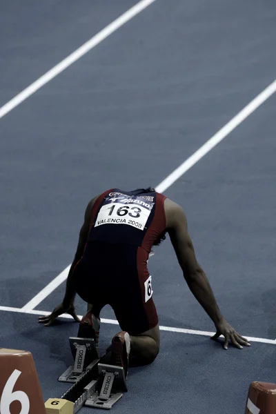 Atleta compete na pista de 60m Men — Fotografia de Stock