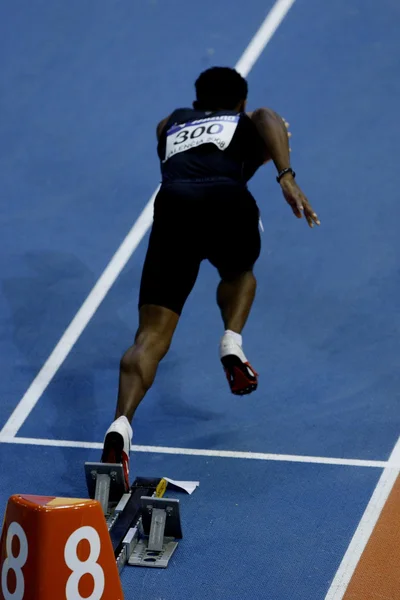 Atleta compite en la pista de 60m Hombres — Foto de Stock