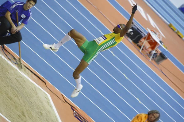 Godfrey Khotso Mokoena konkurrerer i Den lange hopp-finalen. – stockfoto