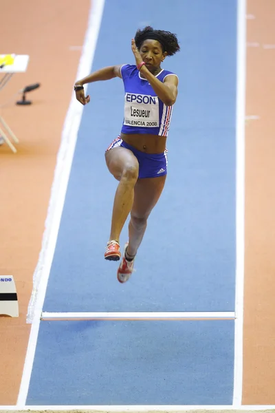 Eloyse Lesueur compite en el salto de longitud femenino —  Fotos de Stock