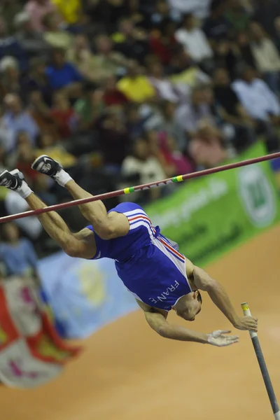 Jerome Clavier compete no salto do pólo masculino — Fotografia de Stock