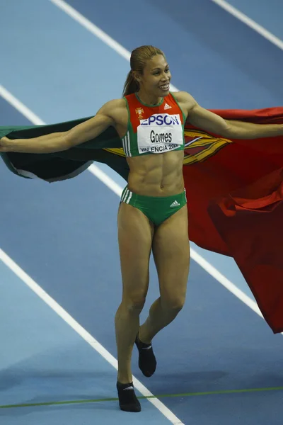 Naide Gomes kutluyor kazanan kadınlar uzun atlama, altın madalya — Stok fotoğraf
