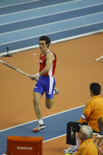 Evgeniy Lukyanenko competes in Men's pole vault — Stock Photo, Image