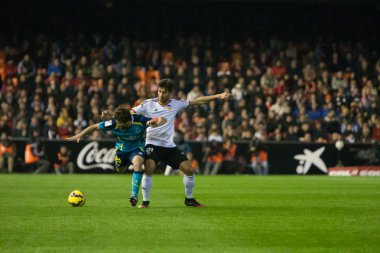 Kola (L) ve Andre Gomes (R) eylem