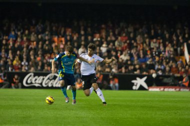 Kola (L) ve Andre Gomes (R) eylem