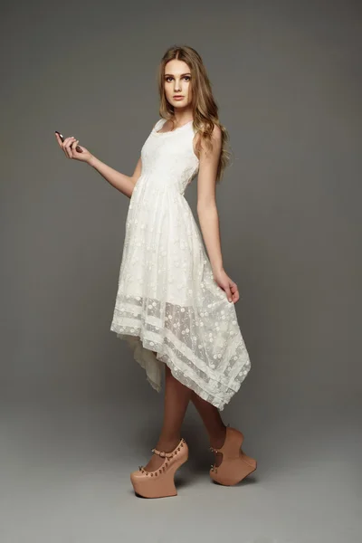 Young girl in unusual lace dress — Stock Photo, Image