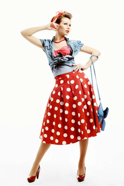 Pin-up young woman in vintage American style with a clutch Stock Image