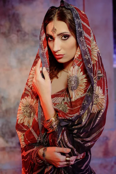 Young beautiful woman in indian costume Stock Image