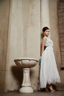 Young beautiful woman with Venice mask