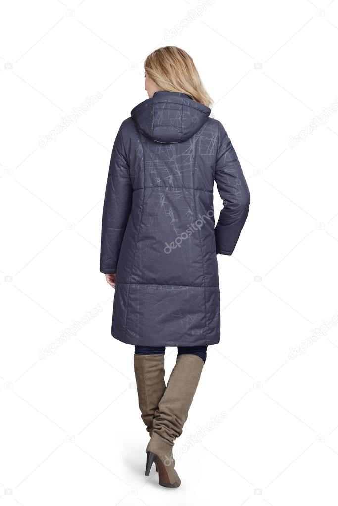 Young woman in long coat
