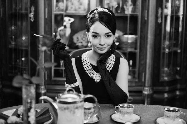 Beautiful girl at the image of Audrey Hepburn — Stock Photo, Image