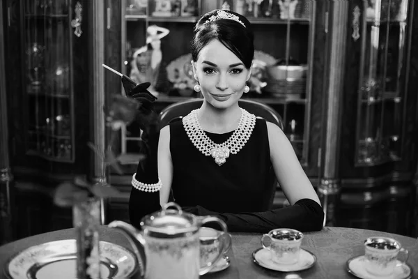 Beautiful girl at the image of Audrey Hepburn — Stock Photo, Image