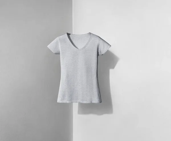 light heather grey v-neck shaped t-shirt for women on light background