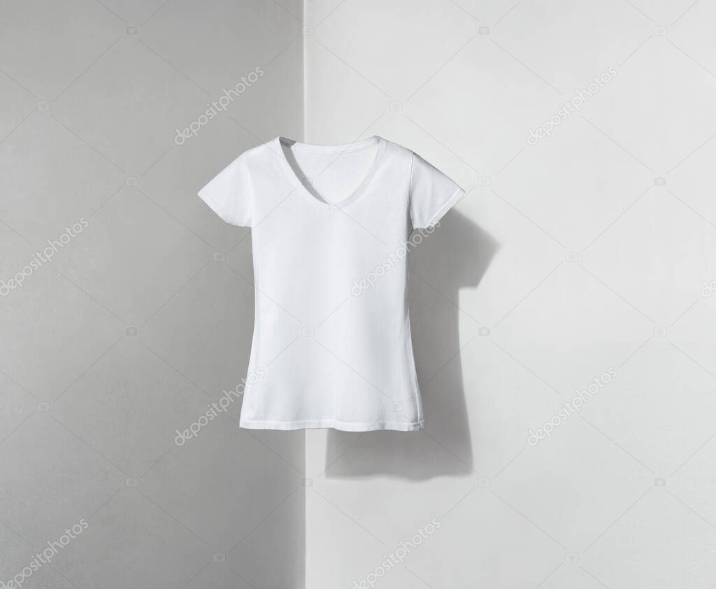 White v-neck t-shirt for women on white and grey background