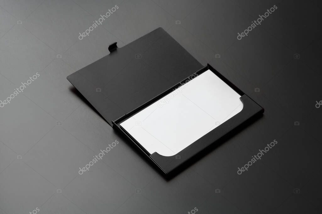 Business card metallic case black matte finish on dark grey background