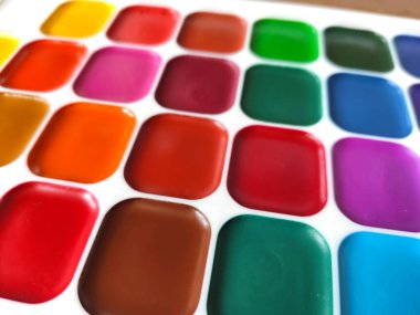 Boya için renk paleti. Renkli suluboya arka plan. Makyaj boyaları.