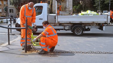 Rome Marchl 10th 2021: Road construction workers wearing mask during covid-19 emergency