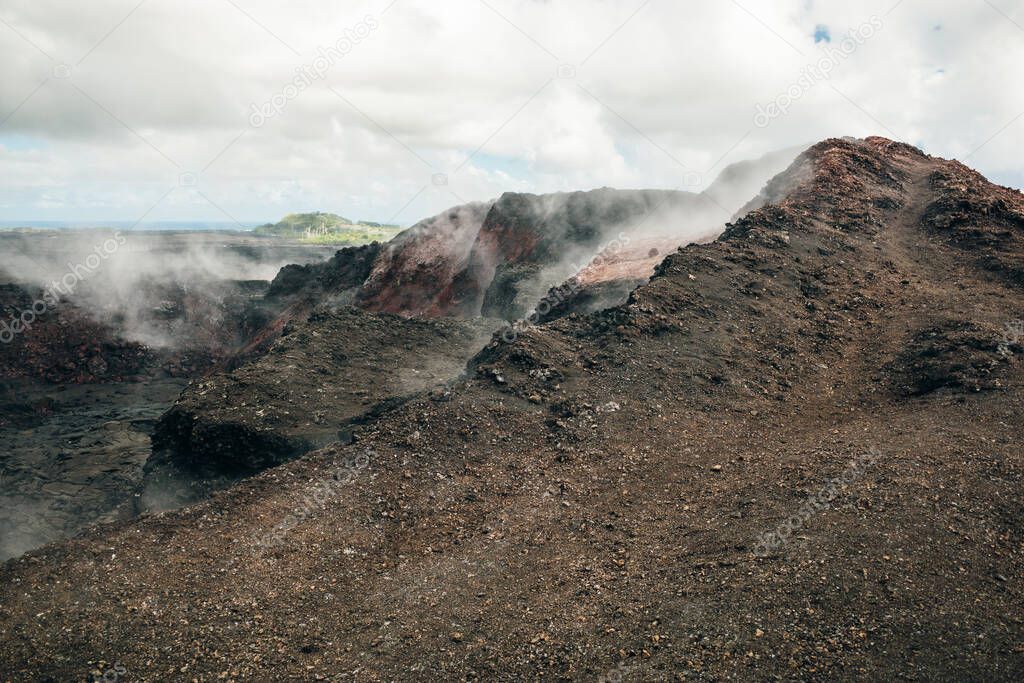 Leilani Estate, Hawaii. - Kilauea volcano eruption hardened black lava field.