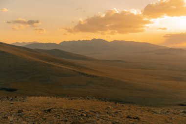 The road across the Tien Shan Mountains to Song - Kul Lake , Kyrgyzstan. High quality photo