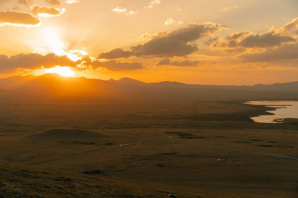 The road across the Tien Shan Mountains to Song - Kul Lake , Kyrgyzstan. High quality photo