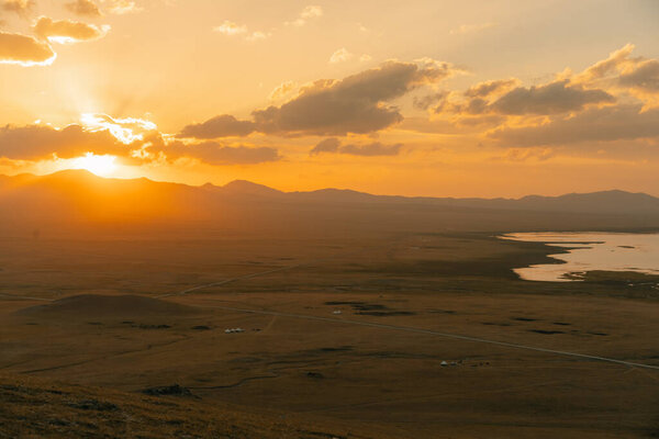 The road across the Tien Shan Mountains to Song - Kul Lake , Kyrgyzstan. High quality photo