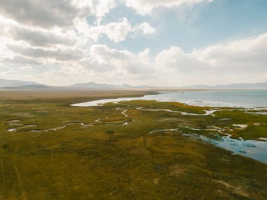 The road across the Tien Shan Mountains to Song - Kul Lake , Kyrgyzstan. High quality photo