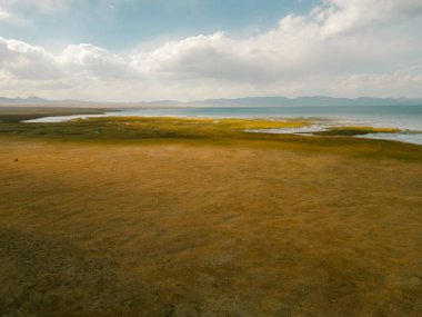 The road across the Tien Shan Mountains to Song - Kul Lake , Kyrgyzstan. High quality photo