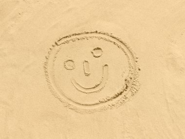 Smiley kum am strand içinde