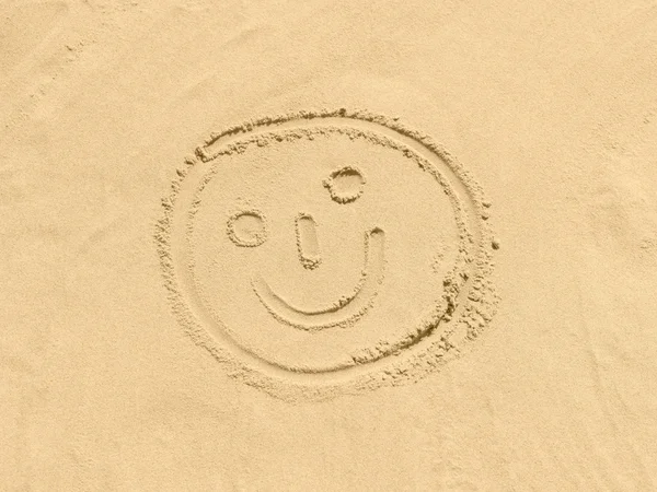 Smiley kum am strand içinde