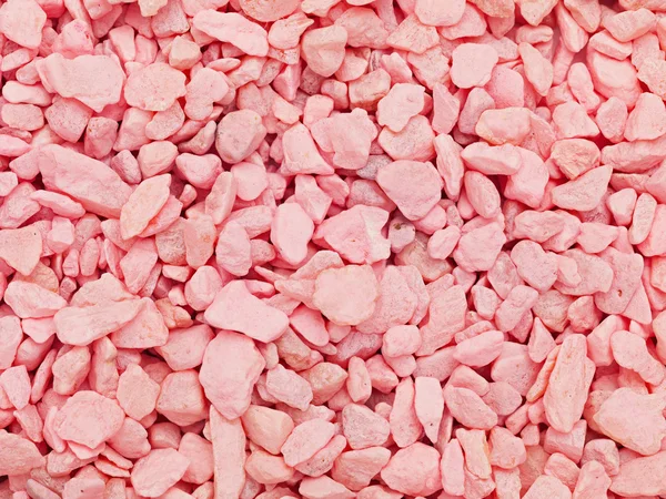 Kleine rosa Steinchen zur Deko oder als Hintergrund — Stock fotografie
